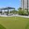 putting green next to pergola covered patio area