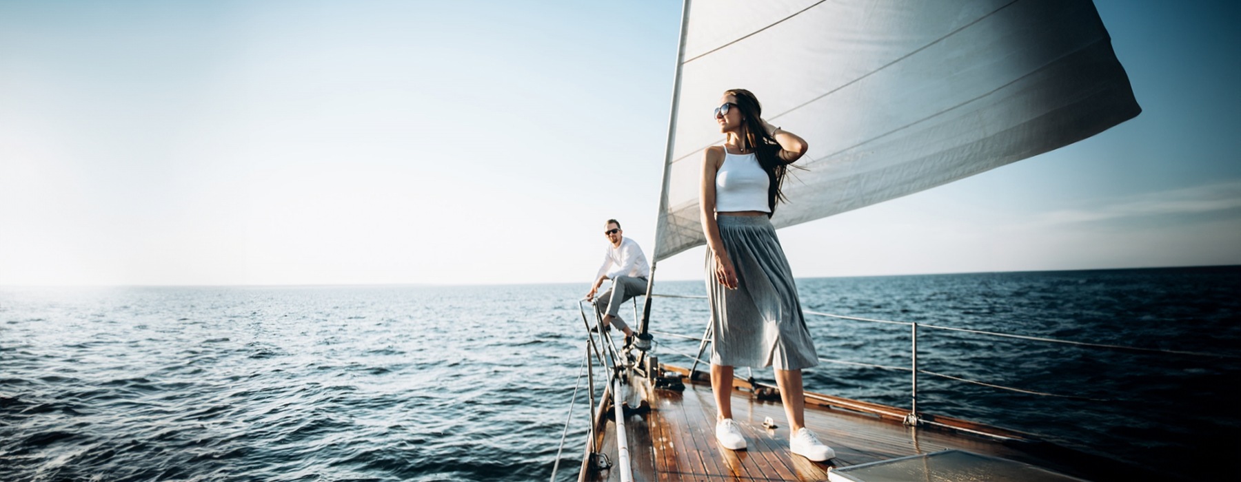 a couple on a sailboat